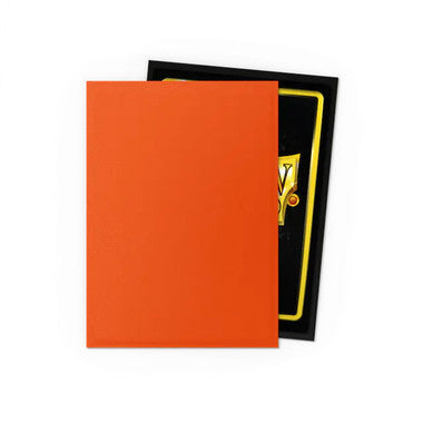 Orange trading card sleeve covering a collectible card on a white background