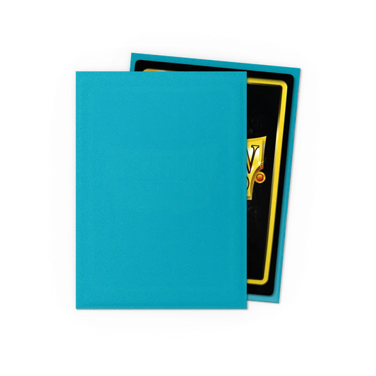 Teal card sleeve protecting trading card on black background